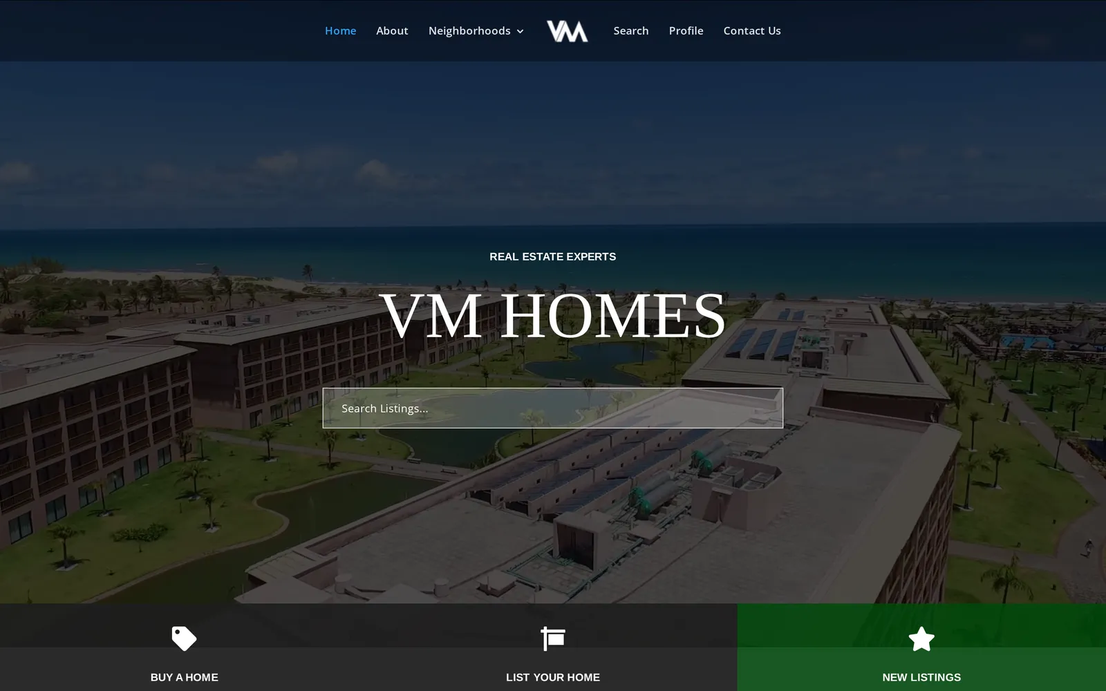 VM Homes homepage — "Real Estate Experts" over a Gulf-front aerial with a property search bar
