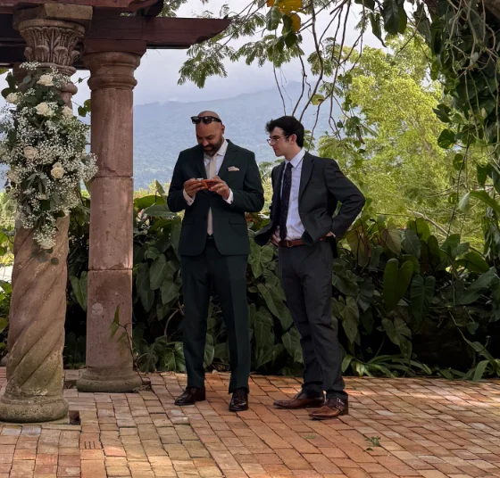 Brandon Harris and Daniel Velez setting up a livestream at a wedding